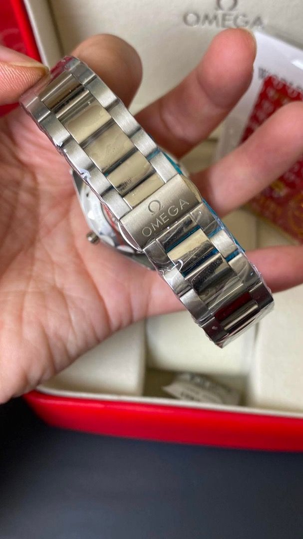 Omega Constellation Watch with Diamond Dial and Box (Category: Luxury Watches) located in Caloocan City. Submitted by mrbigdreams (Listing ID 1469592193, Image 3). Description: - Brand: Omega Constellation - Material: Stainless steel and rose gold two-tone - Dial: Mother of pearl with diamond hour markers - Bezel: Rose gold with Roman numerals - Condition: Mint, with protective plastic wrap still on clasp and links, clean crystal - Inclusions: Or