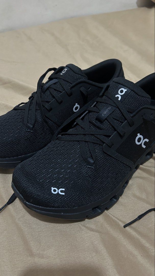 On Cloud X 4 Black Running Shoes Swiss Engineering (Category: Sneakers) located in Taguig. Submitted by lorie_19 (Listing ID 1469671082, Image 1). Description: - Model: On Cloud X 4 running shoes - Color: Black - For Men - Design: Swiss-engineered with Helion superfoam midsole and speedboard plate - Upper: Textured mesh with iconic branding - Condition: Flawless, completely clean outsoles with zero tread wear, scuffs, tears, or dirt - NO BOX - Bo