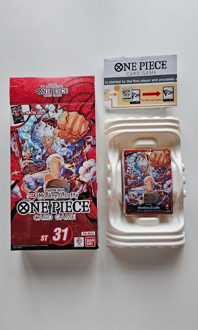 One Piece ST31 Sealed Deck English (Category: Card Boxes & Cases) located in Manila. Submitted by satotoys (Listing ID 1469655473, Image 1). Description: One Piece ST31 Starter deck Opened Box, Sealed Deck (no packs) English Free LBC Shipping P1.7k Loc. Sta. Cruz, Manila Gcash Payment before shipping.