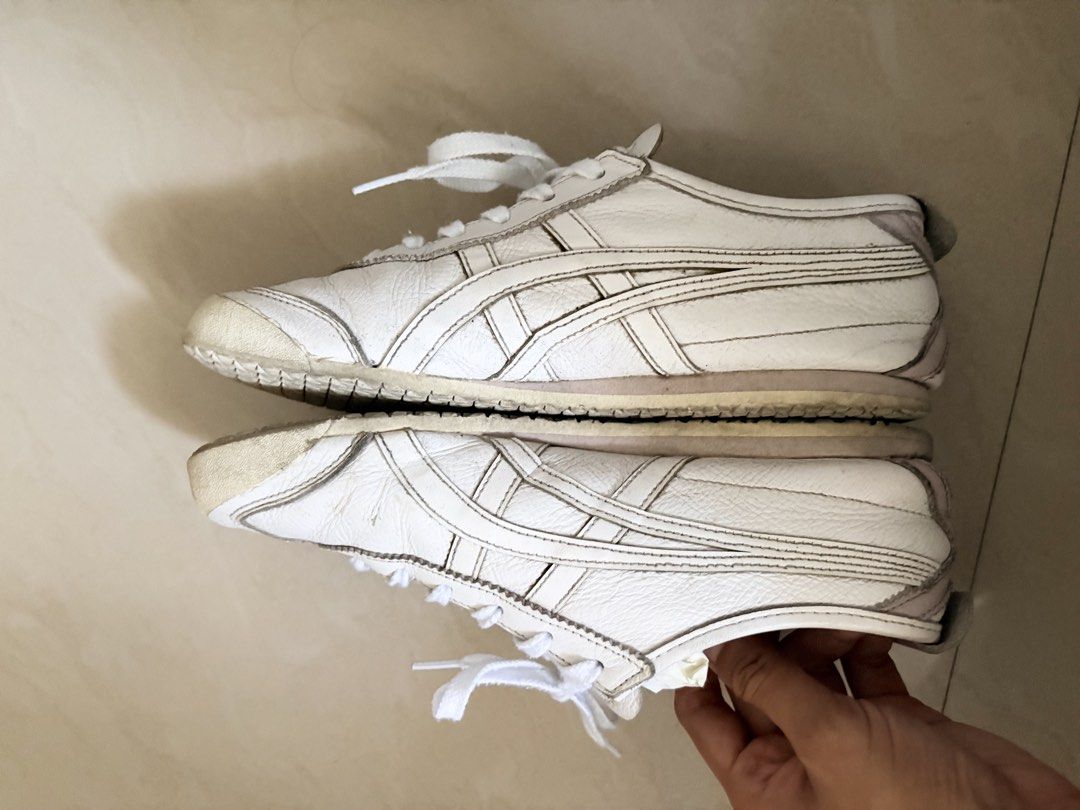 Onitsuka Tiger (Category: Sneakers) located in Cavite. Submitted by enjei (Listing ID 1469626639, Image 3). Description: Needs cleaning. Pls refer to the photos for the actual look. Shipping via j&t or flash xpress..