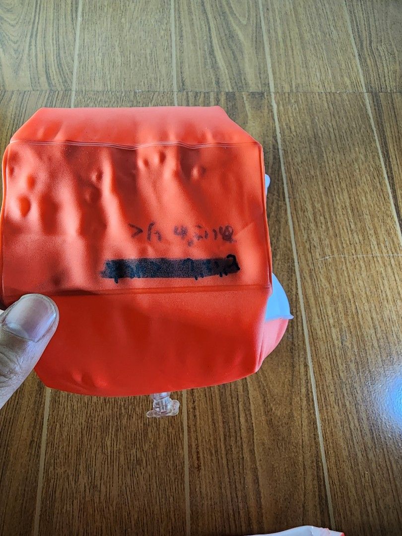 Orange Inflatable Swimming Arm Bands Floaties (Category: Water Sports) located in Meycauayan. Submitted by MP_Shop (Listing ID 1469587996, Image 3). Description: - Pair of orange inflatable arm bands for pool and beach use - Air valves are fully functional with no leaks - Shows normal signs of previous usage - Note: There is Japanese text written in permanent marker on one of the floaties - Affordable and ready for more fun in the water!.