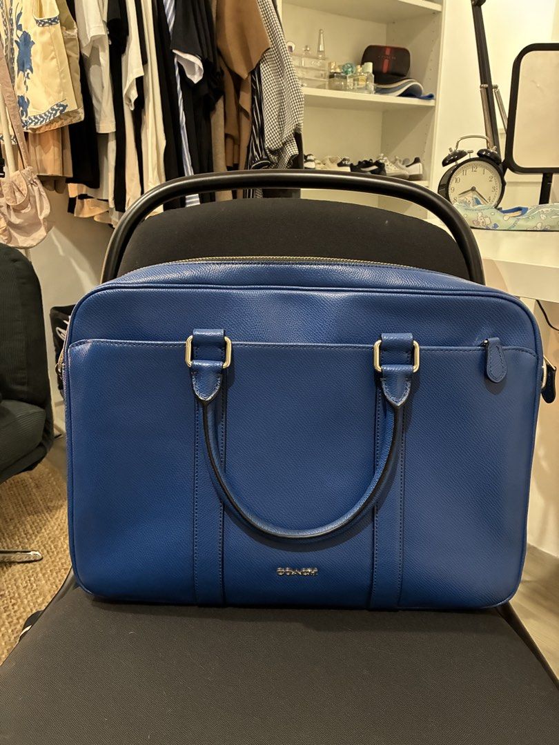 Original COACH Satchel work/laptop bag (Category: Luxury Bags & Wallets) located in Quezon City. Submitted by jamstart.ph (Listing ID 1469593459, Image 1). Description: 95% almost brand new Authentic Coach purchase in Japan Good as work bag Good as laptop bag No dust bag included.