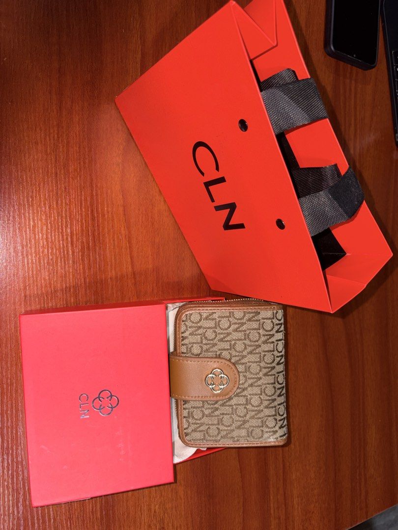 Original CLN Kathie Wallet (Category: Wallets & Card holders) located in Baguio. Submitted by maje_mori (Listing ID 1469689443, Image 1). Description: - Inclusion: Original CLN Paper bag and box. - Dimensions: Slightly elongated variant at 4.56 inches (Length) x 3.75 inches (Height). .