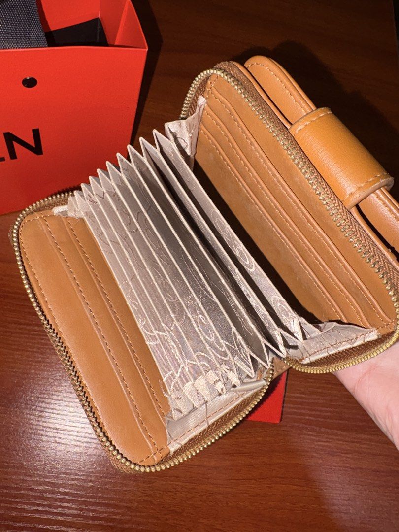 Original CLN Kathie Wallet (Category: Wallets & Card holders) located in Baguio. Submitted by maje_mori (Listing ID 1469689443, Image 3). Description: - Inclusion: Original CLN Paper bag and box. - Dimensions: Slightly elongated variant at 4.56 inches (Length) x 3.75 inches (Height). .