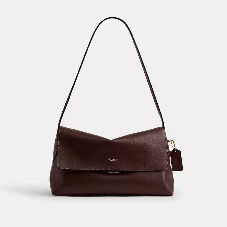 💯ORIGINAL COACH CHELSEA 30 IN MAPLE (Category: Shoulder Bags) located in Quezon City. Submitted by ashongsstore (Listing ID 1469609404, Image 1). Description: ✨ C0ACH CHELSEA 30 in MAPLE✨ 🇵🇭AVAILABLE🇵🇭 Effortlessly cool with a laid-back sophistication, our Chelsea is a minimalist style designed with a New York attitude. Crafted of natural grain leather with beautiful texture and soft feel, the 30 features an open interior with space for dail