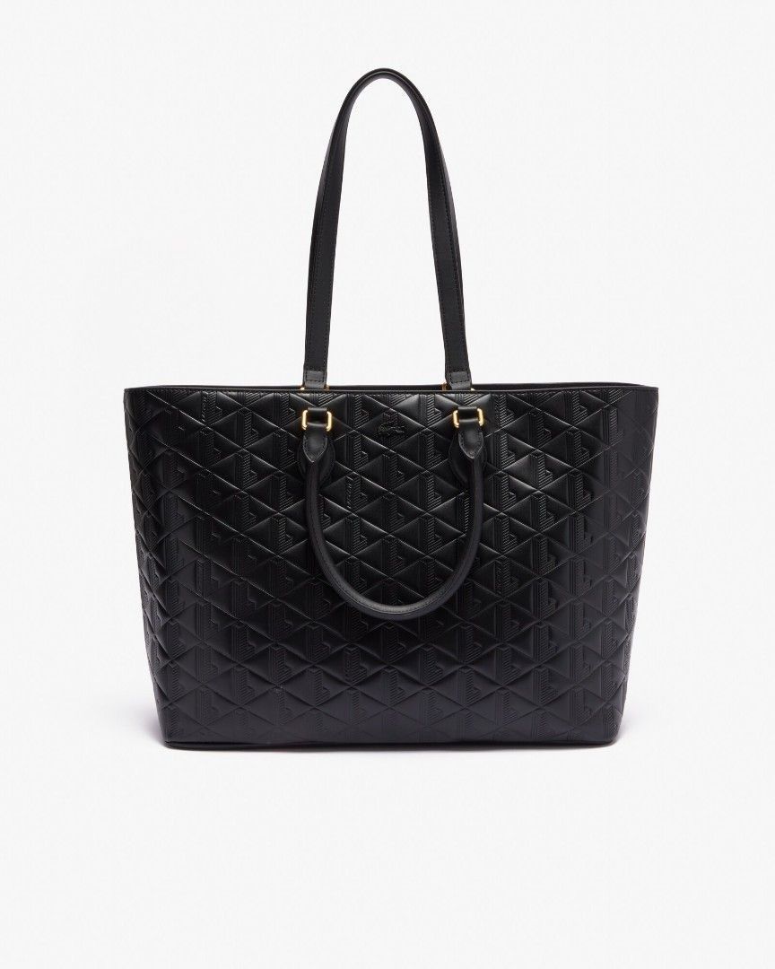 Original Lacoste Maheki Embossed Leather Tote Bag (Category: Shoulder Bags) located in Manila. Submitted by herrerakri36634 (Listing ID 1469743443, Image 1). Description: STEAL PRICE!!! Condition: Good pre-owned condition. Please note there is minor wear/chipping on the black metal crocodile logo GUARANTEED LEGIT STORE BOUGHT SRp-17,950 The new Maheki line features a signature monogram, building on years of Lacoste style. This generous leather to