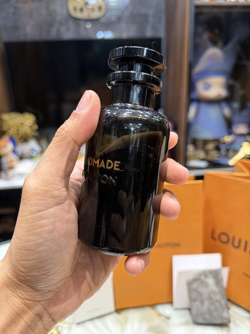 ORIGINAL Louis Vuitton Ombre Nomade 100ml with receipt (Category: Fragrance & Deodorants) located in Mandaluyong City. Submitted by norbert29 (Listing ID 1469682300, Image 2). Description: - Authentic Louis Vuitton Ombre Nomade 100ml fragrance bottle ** have receipt **reason for selling i bought 3. - Rich and woody scent profile with incredible, long-lasting projection - Premium dark glass bottle accented with elegant gold lettering - Iconic magn