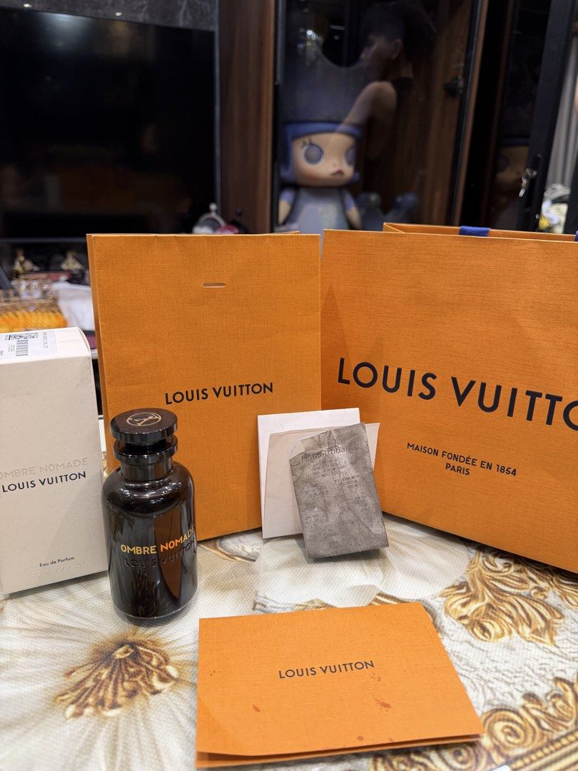 ORIGINAL Louis Vuitton Ombre Nomade 100ml with receipt (Category: Fragrance & Deodorants) located in Mandaluyong City. Submitted by norbert29 (Listing ID 1469682300, Image 1). Description: - Authentic Louis Vuitton Ombre Nomade 100ml fragrance bottle ** have receipt **reason for selling i bought 3. - Rich and woody scent profile with incredible, long-lasting projection - Premium dark glass bottle accented with elegant gold lettering - Iconic magn