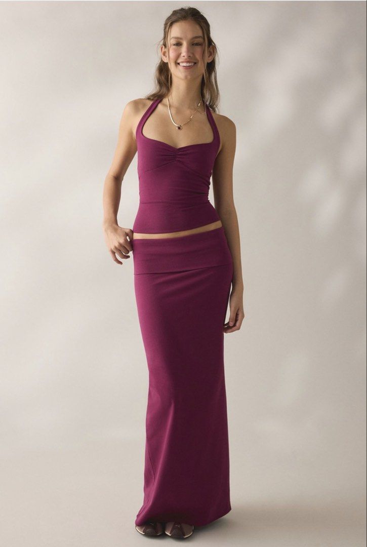 Out From Under Foldover Maxi Skirt (Category: Skirts) located in Makati City. Submitted by belizalde4 (Listing ID 1469654119, Image 1). Description: - Brand: Out From Under - Style: Maxi skirt with a trendy foldover waistband - Color: Rich plum purple - Material: Stretchy, curve-hugging knit fabric - Size: Medium (tag attached) - can fit L - Condition/Use: Super comfortable piece for lounging or casual wear.