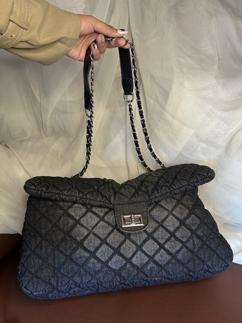OVERSIZED QUILTED DENIM CHAIN SHOULDER BAG (Category: Shoulder Bags) located in Baguio. Submitted by chmlnstudios (Listing ID 1469666388, Image 1). Description: OVERSIZED QUILTED DENIM CHAIN SHOULDER BAG CODE: C11-B03 An ultra-spacious, Y2K-inspired statement tote made from dark-wash quilted denim. Featuring woven leather-and-chain shoulder straps and a classic turn-lock front flap, this bag combines chic luxury aesthetic with everyday streetwear