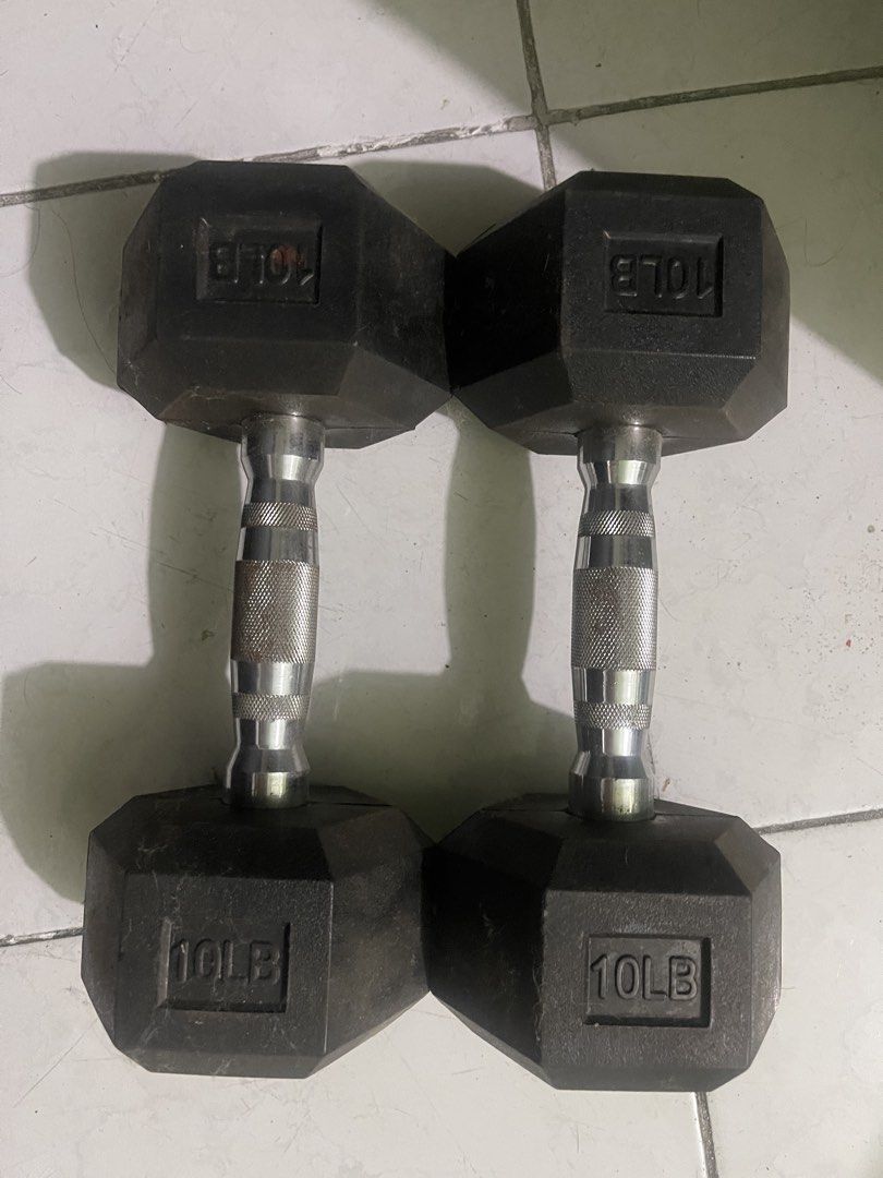 Pair of 10LB Hex Rubber Dumbbells (Category: Weights & Dumbbells) located in Manila. Submitted by pasaybestfinds (Listing ID 1469677587, Image 1). Description: - Pair of 10-pound rubber hex dumbbells - Textured chrome handles for a secure, slip-free grip - Classic hexagonal heads prevent rolling - Sturdy and durable for home workouts and fitness routines - Minor storage dust, ready to wipe clean and use - Available for pickup.