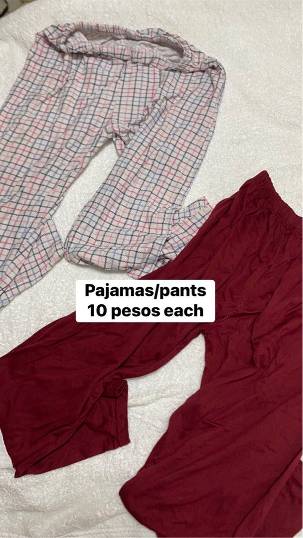 Pajamas and Lounge Pants Set (Category: Sets or Coordinates) located in Manila. Submitted by remotorose29730 (Listing ID 1469643704, Image 1). Description: - Set of 2 comfy lounge pants/pajamas - Pair 1: Light plaid pattern with pink and blue lines - Pair 2: Solid dark maroon red - Features easy-fit elastic waistbands - Super soft fabric, perfect for sleeping or daily lounging - Buy individually or take both for a better deal! - Condition: Brand 