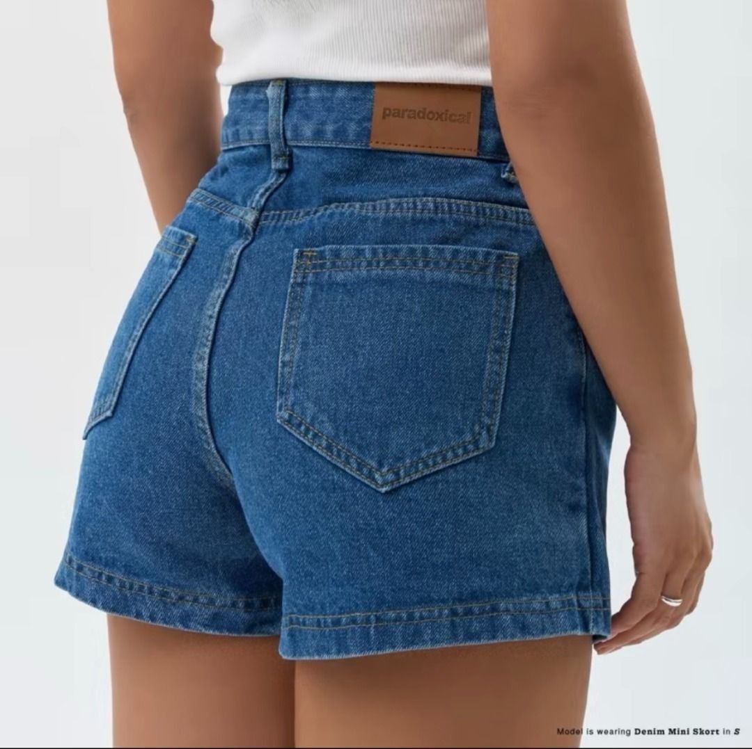 Paradoxical Denim Mini Skort in Dark Blue (Category: Skirts) located in Binan City. Submitted by lexiieverse (Listing ID 1469597562, Image 2). Description: Size SMALL! I got this for 649 pesos. Its kinda loose on me huhu.