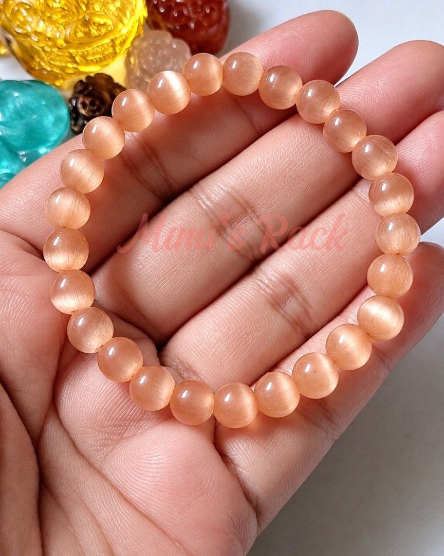 Peach Cat's Eye Stone Bracelet (Category: Bracelets) located in Taguig. Submitted by mimisrack (Listing ID 1469722655, Image 2). Description: 🧡🛡️ Protection & Intuition — cat’s eye stones are traditionally associated with protection, awareness, and trusting your instincts. ❤️ Love & Warmth — peach tones symbolize affection, tenderness, and harmonious relationships. 💗 Self-Love & Compassion — represents self-acceptance, kindness, and emotional 