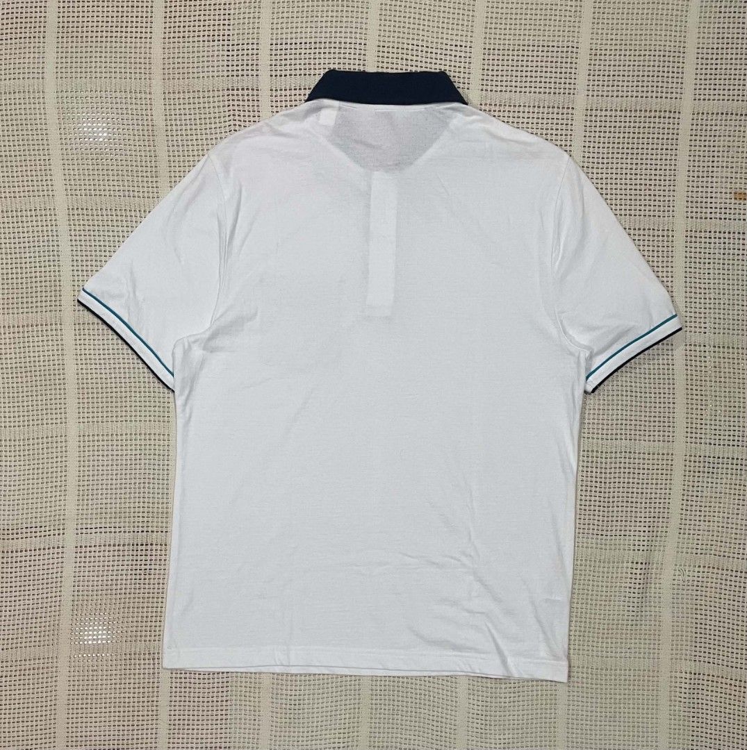 Penguin by Munsingwear Polo Shirt (Category: Luxury Apparel) located in Bacolod City. Submitted by abkicks_apparel (Listing ID 1469729230, Image 2). Description: Penguin by Munsingwear Polo Shirt ( Heritage Slim Fit ) Large on Tag W21 L28.5 Authentic Original As New Condition No Hidden Issues .
