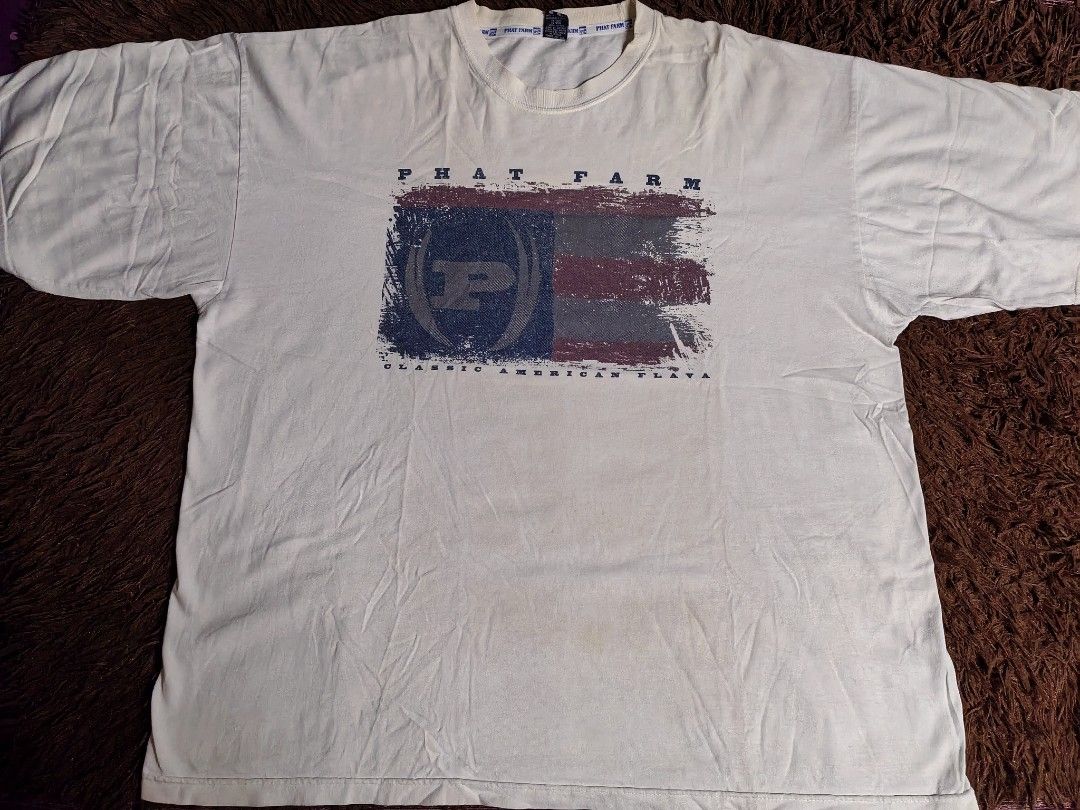Phat Farm Logo Shirt (Category: Tshirts & Polo Shirts ) located in San Juan City. Submitted by reddvelasquez4298 (Listing ID 1469588834, Image 1). Description: Phat Farm Logo Shirt Size XL 26 Width 30.5 Length Good Condition Issues himulmol, yellow stains, dirt stains. Check photos. 😊 500 pesos PM.