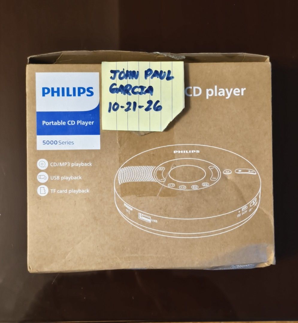 Philips Portable CD Player 5000 Series (Category: Portable Music Players) located in Bamban. Submitted by gooogleu253 (Listing ID 1469704031, Image 1). Description: - Model: Philips 5000 Series Portable CD Player (Black) - Versatile Playback: Supports CD, MP3, USB, and TF card - Condition: New open box, exceptionally clean and working perfectly - Inclusions: Comes with original box, user manual, and charging cable - Ready to use: Plug and play yo