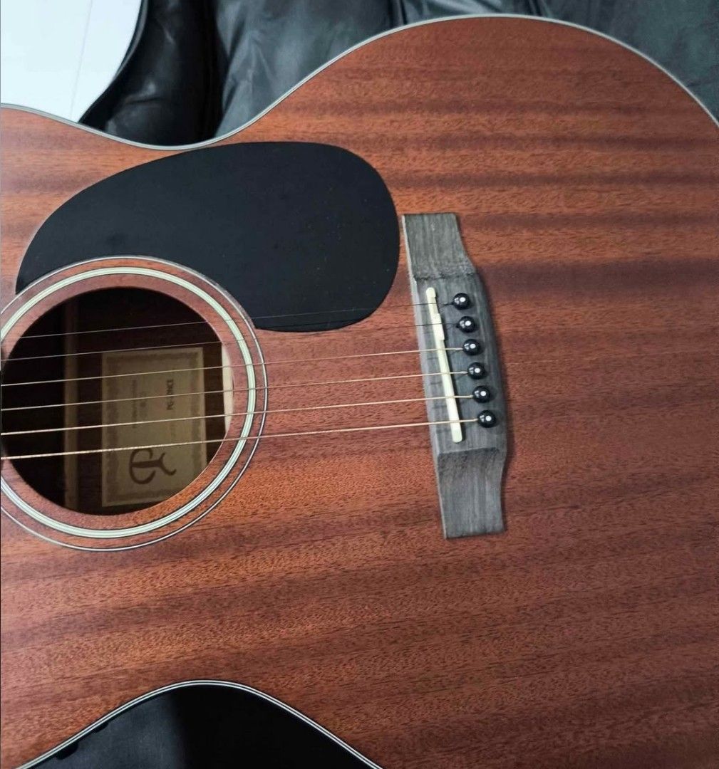 Phoebus Acoustic Guitar (PG-20 NCE V3) (Category: Musical Instruments) located in Taguig. Submitted by jimbaleno (Listing ID 1469621795, Image 2). Description: - Brand: Phoebus Acoustic Guitar with padded bag and accessories - Finish: Rich brown wood with clean wood grain on body and neck - Electronics: Built-in Fishman Presys preamp system with volume, contour, phase controls, and onboard tuner - Hardware: Black tuning pegs and matching pickguar