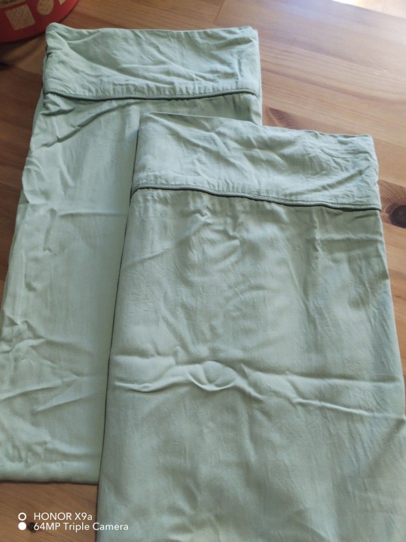 Pillow case ( Long) (Category: Bedding & Towels) located in Muntinlupa City. Submitted by arciagamaryann68 (Listing ID 1469590528, Image 1). Description: - Type: Long Pillow Case - Color: Light Green with dark piping accent - Perfect for standard long pillows - Soft and comfortable material cotton fabric need lang ng Plantsa.