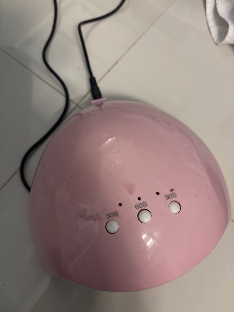 Pink UV LED Nail Lamp with Timer Settings (Category: Hands & Nails) located in Manila. Submitted by yuribeepbop (Listing ID 1469693887, Image 1). Description: - no issues .