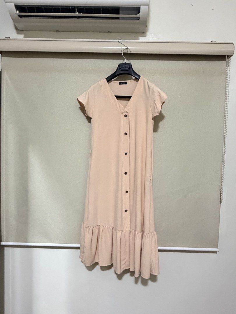 Pink V-neck Button-down Midi Dress with Ruffle Hem (Category: Dresses) located in Cavite. Submitted by mgd.blessed (Listing ID 1469641712, Image 2). Description: - Pastel pink midi dress - Flattering V-neckline with short sleeves - Functional dark button front detail - Cute ruffled tier at the bottom hem - Soft fabric with a relaxed, comfortable fit - Clean, well-maintained, and ideal for warm weather.
