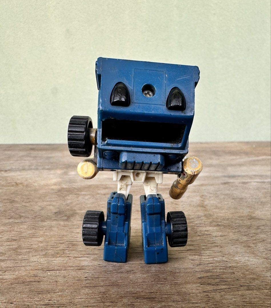 Pipes - Transformers G1 Mini Figure (Category: Action & Battle Toys) located in Mandaluyong City. Submitted by collectorsobsessions (Listing ID 1469656116, Image 3). Description: Pipes - Transformers G1 Mini Figure - Arms are loose. - Missing/chipped one wheel in the front. - Left leg is tight and can be difficult to move up when transforming him to a truck. - Right leg is semi-loose, making the figure stand uneven sometimes. You need to pull it 