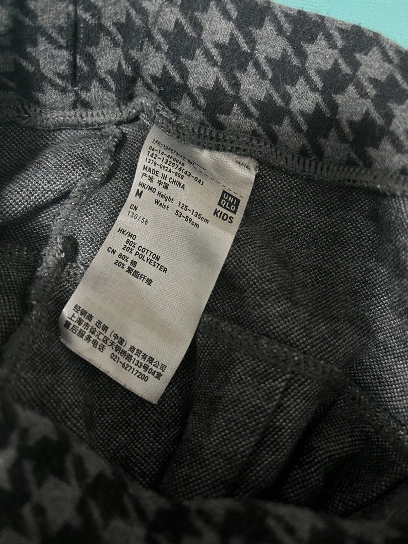 Pleated Skirt (Category: Skirts) located in Quezon City. Submitted by prelovedbykhy (Listing ID 1469739248, Image 2). Description: - Brand: Uniqlo Kids (fits XS adults) - Item: Kids flared pleated skirt - Pattern: Classic grey and black houndstooth - Size: M (Fits height 125-135 cm, waist 53-59 cm) - Material: 80% cotton, 20% polyester (soft & comfortable) - Features: Elastic waistband for easy fit, great for everyday wear.