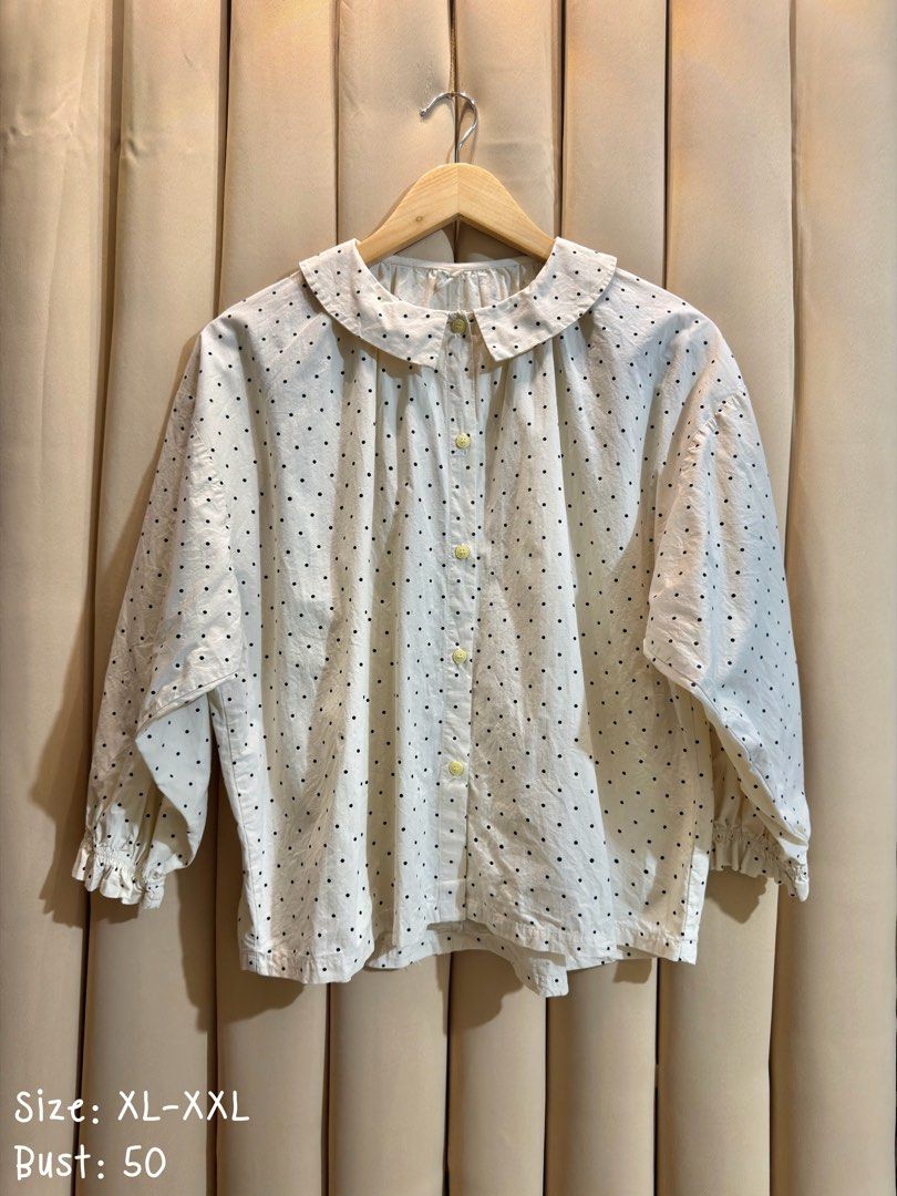 POLKA BUTTON-DOWN BLOUSE (Category: Longsleeves) located in Manila. Submitted by glamstylemnl (Listing ID 1469739711, Image 1). Description: ♡ SIZE: XL-XXL ♡ BUST: 50 ♡ Swipe left to see the actual color & details ♡ rounded collar, ruffled sleeve cuffs ♡ HQ • 10/10 ♡ Ready to wear 👚.