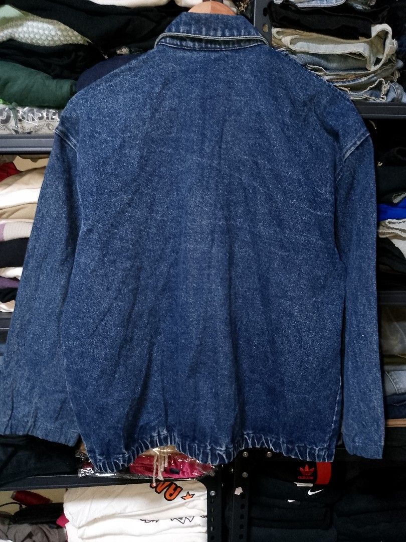 Polo by Ralph Lauren Blue Denim Jacket (Category: Coats, Jackets and Outerwear) located in Manila. Submitted by mjthrifted_second (Listing ID 1469639867, Image 2). Description: - Brand: Polo by Ralph Lauren - Style: Classic dark wash full-zip denim jacket -Dimes: 24/25 - Details: Iconic red embroidered polo player logo on chest - Pockets: Two front welt pockets - Fit: Elasticized hem at the back for a snug fit - Condition: Excellent quality with 