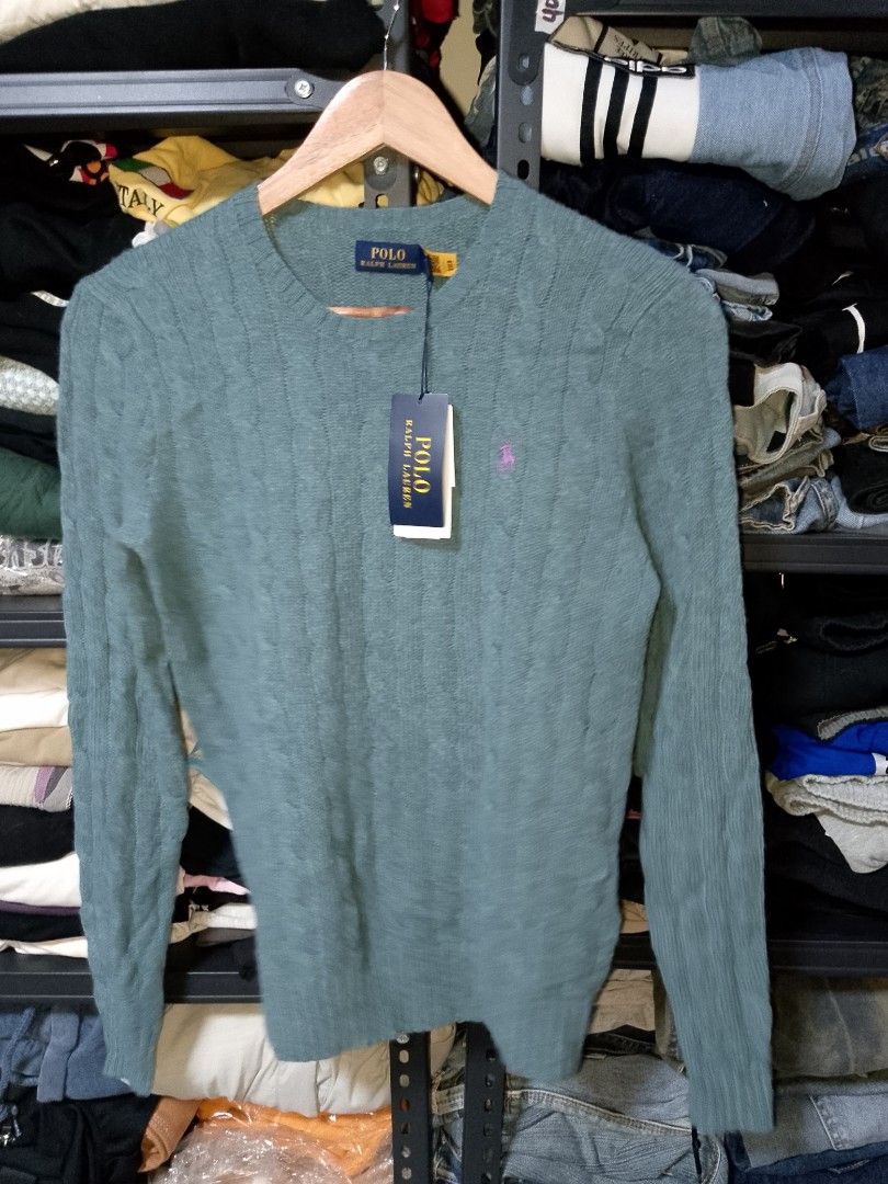 Polo Ralph Lauren Cable Wool Crewneck Sweater (Category: Coats, Jackets and Outerwear) located in Manila. Submitted by mjthrifted_second (Listing ID 1469658699, Image 2). Description: - Brand: Polo Ralph Lauren - Item: Cable Wool Crewneck Sweater - Color: Blue - Size: S (fits true to size) -Dimes: 18/24 - Condition: Brand new with original store tags attached - Material: Soft wool and cashmere blend - Details: Classic cable knit pattern, ribbed t
