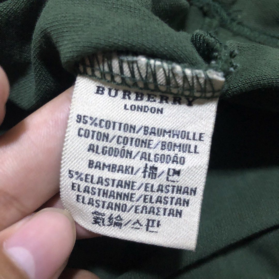 Polo Shirt By BURBERRY (Category: Tshirts & Polo Shirts ) located in Manila. Submitted by messiah.vanriz (Listing ID 1469739603, Image 3). Description: 9/10 condition, the only issue is the buttons are replaced (i can send proofs that it is infact replaced).