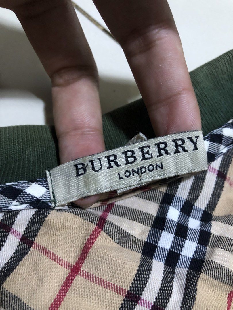 Polo Shirt By BURBERRY (Category: Tshirts & Polo Shirts ) located in Manila. Submitted by messiah.vanriz (Listing ID 1469739603, Image 2). Description: 9/10 condition, the only issue is the buttons are replaced (i can send proofs that it is infact replaced).