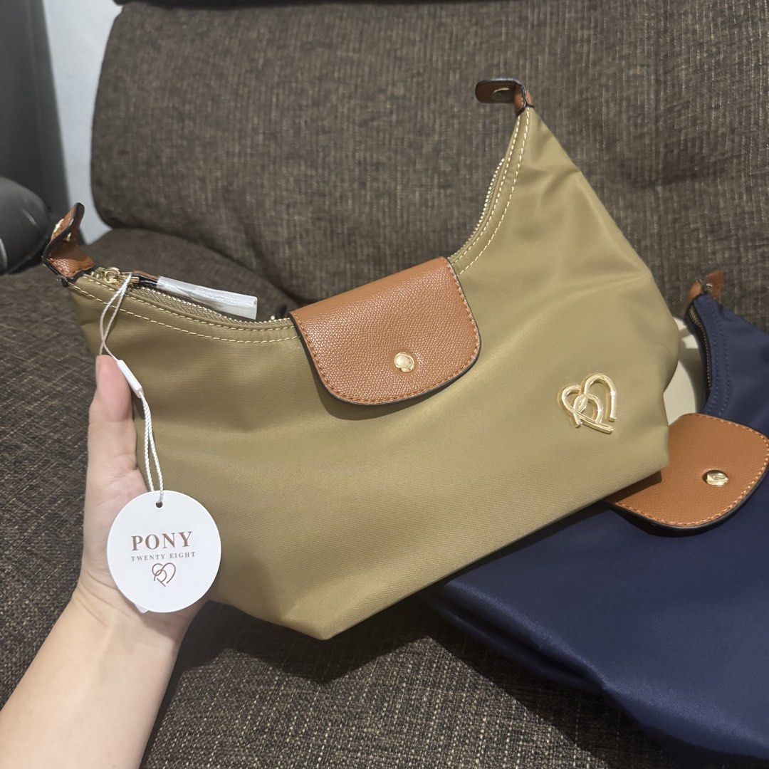 Pony TwentyEight Moya (Category: Cross-body Bags) located in Bulacan. Submitted by mykakarizza (Listing ID 1469749048, Image 2). Description: SALE✨✨ ₱700 onlyyy (Reg price 800) Pony TwentyEight Moya Size: 25 x 22 x 11 cm 📸 Actual pics! 🙋🏻‍♀️ ─── ✦ ─── ✦ ─── ✦ ─── ✦ ─── 🛍️ LOOKING FOR MORE RESELLERS 🛍️ ✨ Buy 3 pcs of ANY items — FREE SHIPPING NA!🚚 ✨ Buy 10 items → FREE SF + ₱50 OFF EACH! 💖 PM us for 30 pcs & up WS 🤍 #Mallpulloutbagssupplie