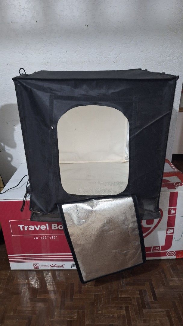 Portable Photo Studio Light Box with Built-in LEDs (Category: Lighting & Studio Equipment) located in Angeles City. Submitted by pamdiel003 (Listing ID 1469613035, Image 2). Description: - Portable black photo studio box for professional product photography - Built-in LED lighting with a convenient dial controller for brightness adjustment - Foldable, compact design that is easy to pack up and store away - Secure front opening flap for multiple s