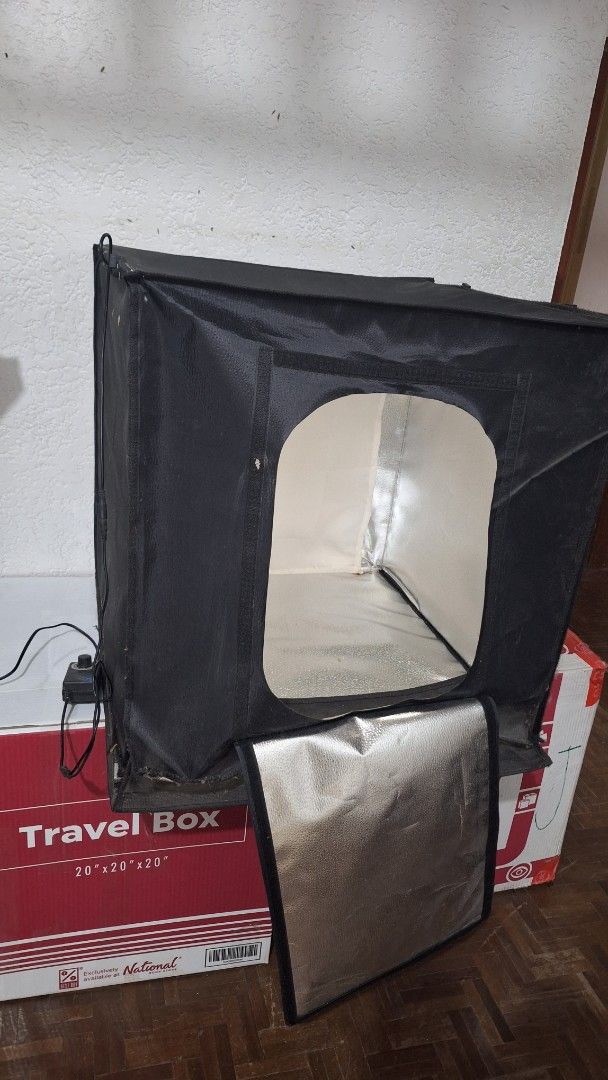 Portable Photo Studio Light Box with Built-in LEDs (Category: Lighting & Studio Equipment) located in Angeles City. Submitted by pamdiel003 (Listing ID 1469613035, Image 3). Description: - Portable black photo studio box for professional product photography - Built-in LED lighting with a convenient dial controller for brightness adjustment - Foldable, compact design that is easy to pack up and store away - Secure front opening flap for multiple s