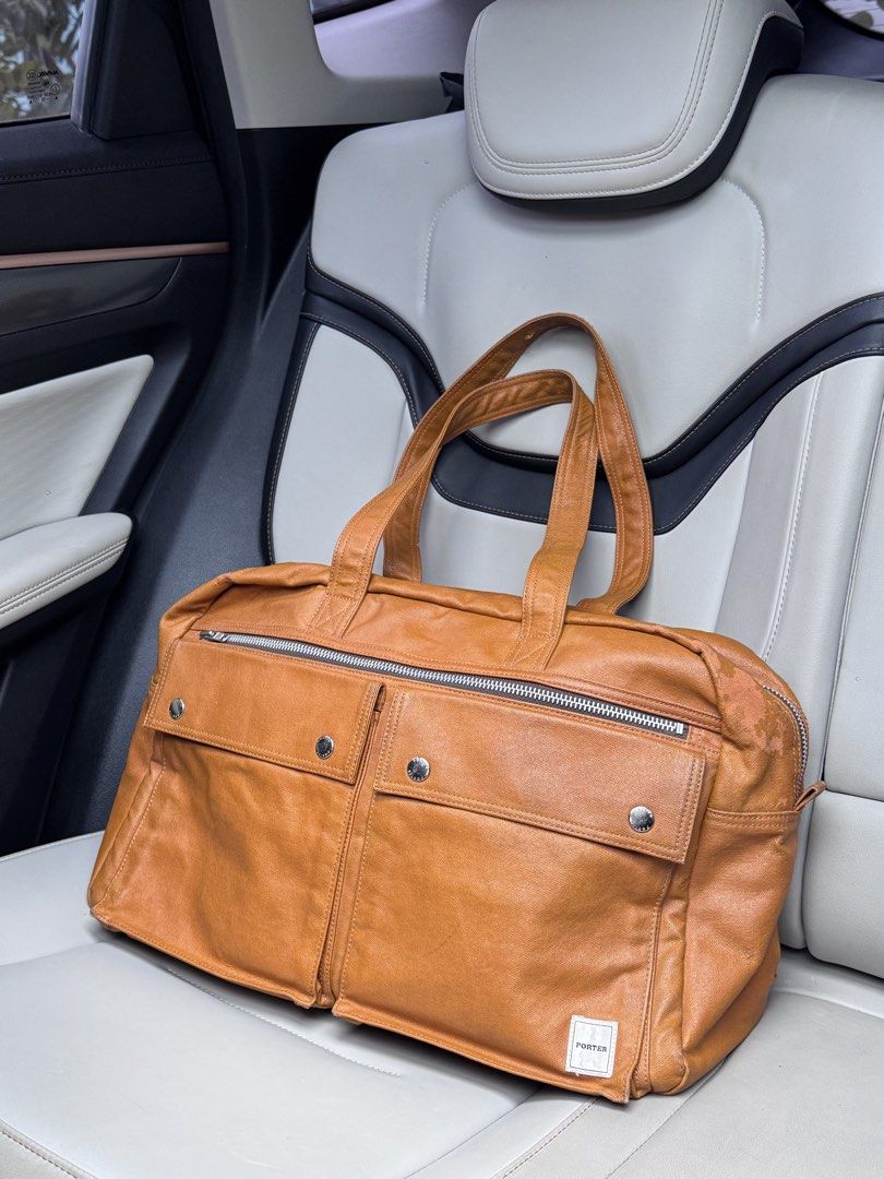 PORTER Yoshida Travel Bag (Category: Luggage) located in Manila. Submitted by thriftyhaven2023 (Listing ID 1469591173, Image 1). Description: Good for overnight or 3Day trip luggage. Has some normal signs of usage. Still very nice in actual..