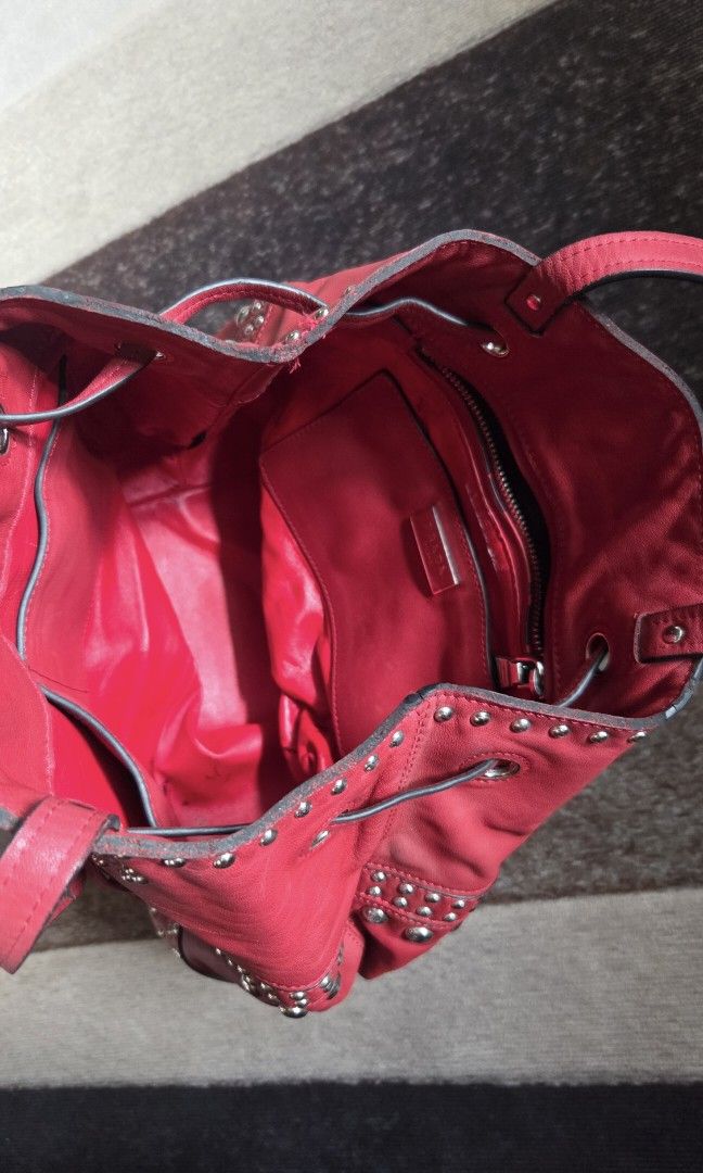 Prada pre fall 2014 studded bucket bag (Category: Luxury Bags & Wallets) located in Pagudpud. Submitted by jmpascual044757 (Listing ID 1469594370, Image 2). Description: 100% Guaranteed ORIGINAL!! PERSONAL PRELOVED. the bag was bought by my mom, and guarantees its a.uthe.ntici.ty aswell as i have it self authenticated, however since it doest have inclusions its still buyers discretion. If youre in doubt or clueless kf this kinds of bag please by 