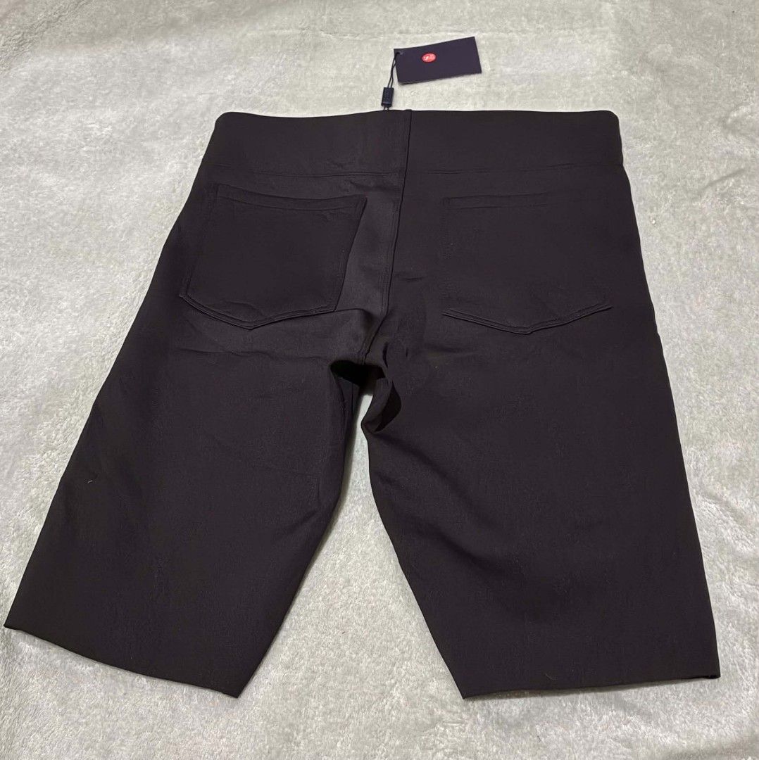 Prada Black Technical Fabric Shorts (Category: Shorts) located in Nabunturan. Submitted by kairosas85 (Listing ID 1469678041, Image 2). Description: - Authentic Prada black shorts - Material: Stretchy technical fabric for ultimate comfort - Fit: Mid-length with an elasticated waistband - Details: Signature enamel triangle logo on the right leg, back pockets - Condition: Brand new with brand tag and care labels attached - Origin: Made in Moldova -