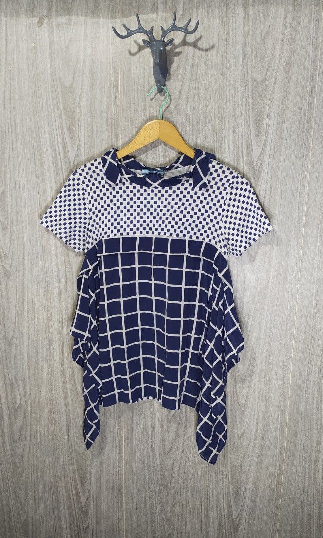 Prada Blouse Short Sleeves (Category: Blouses) located in Naga. Submitted by secondspinv2 (Listing ID 1469639257, Image 1). Description: Prada Blouse Short Sleeves ✅Size: S ✅Width: 12 ✅Length: 25 ✅Color Rate: 9/10 ✅Good Condition ✅Sign Of Usage ✅Need Wash ✅Location: Bicol Naga City, Camarines Sur ✅Courier: J&T Express/Flash Express ✅MOP: Gcash only.