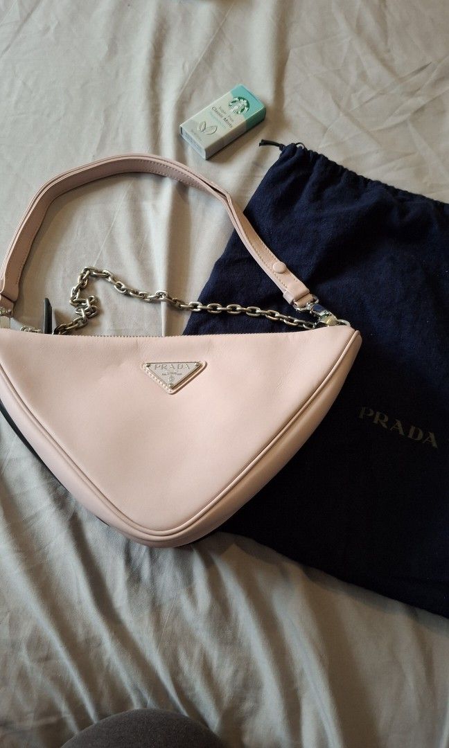 Prada duo triangle pouch sling bags witj dustbags (Category: Everything Else Others) located in Angono. Submitted by bagamania (Listing ID 1469592921, Image 1). Description: .