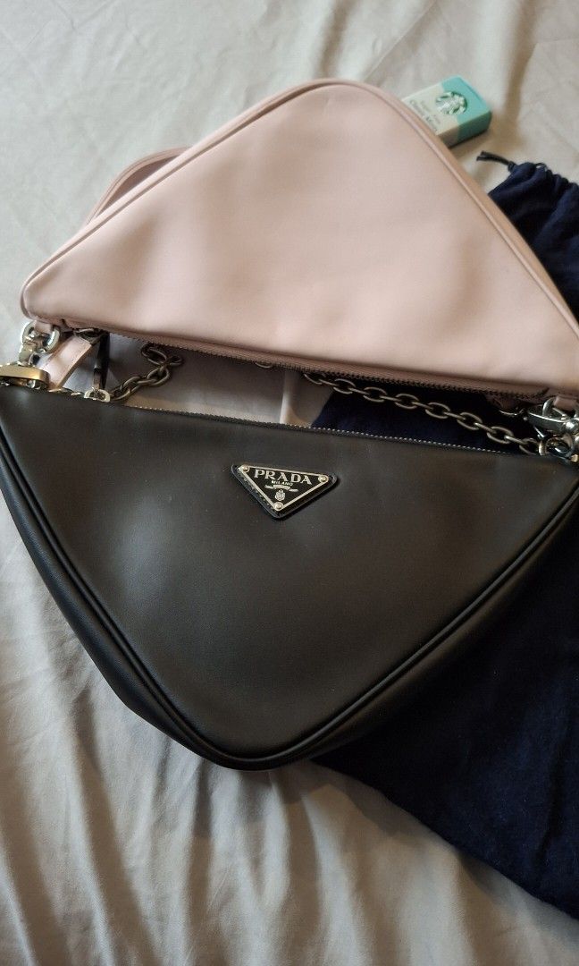 Prada duo triangle pouch sling bags witj dustbags (Category: Everything Else Others) located in Angono. Submitted by bagamania (Listing ID 1469592921, Image 3). Description: .
