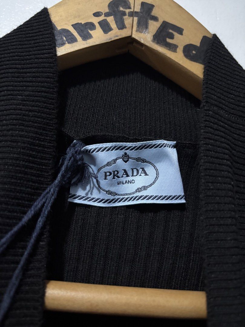 Prada Knitted Crewneck Long Sleeves (Authentic) (Category: Luxury Apparel) located in Makati City. Submitted by ThriftedGoods (Listing ID 1469689350, Image 2). Description: Feel free to ask for more detailed photos In excellent condition No issues Length-28.5 Width-19.