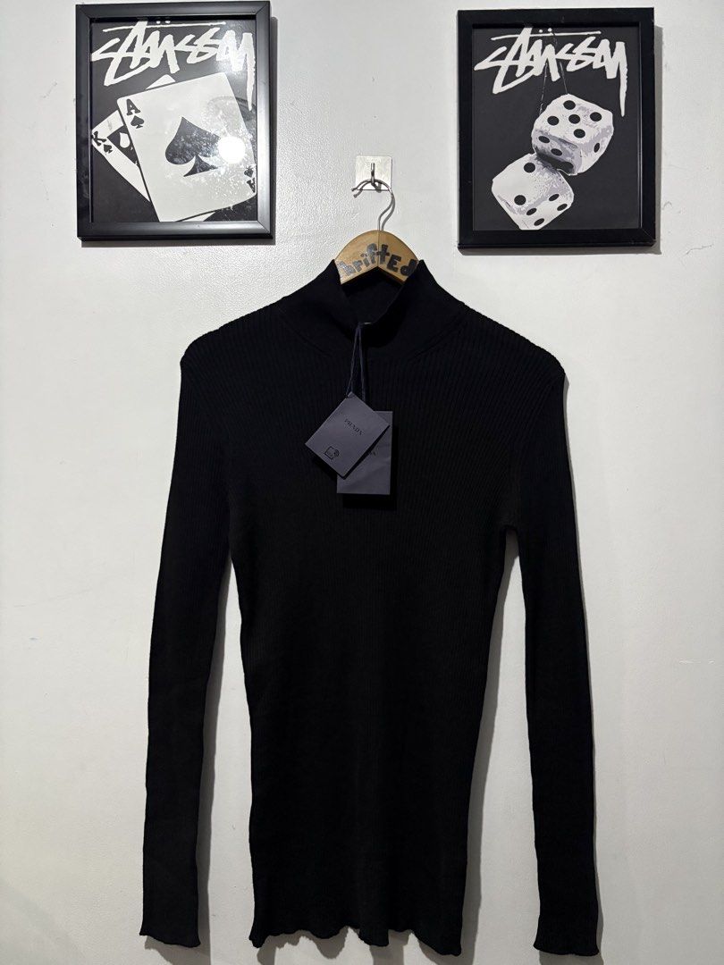 Prada Knitted Crewneck Long Sleeves (Authentic) (Category: Luxury Apparel) located in Makati City. Submitted by ThriftedGoods (Listing ID 1469689350, Image 1). Description: Feel free to ask for more detailed photos In excellent condition No issues Length-28.5 Width-19.