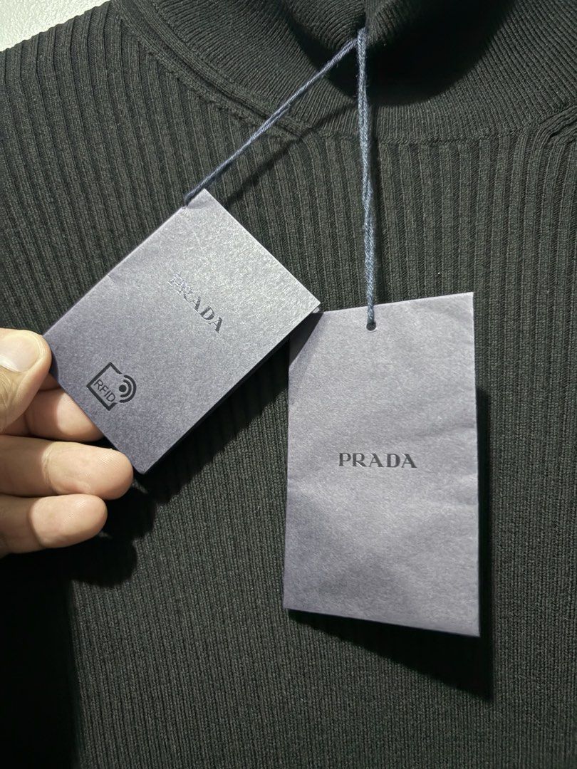 Prada Knitted Crewneck Long Sleeves (Authentic) (Category: Luxury Apparel) located in Makati City. Submitted by ThriftedGoods (Listing ID 1469689350, Image 3). Description: Feel free to ask for more detailed photos In excellent condition No issues Length-28.5 Width-19.