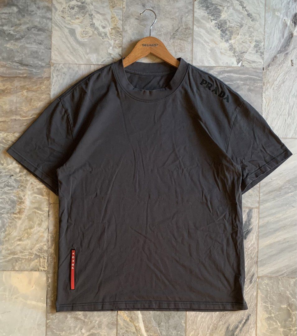 PRADA LINEA ROSSA TECH TEE (Category: Luxury Apparel) located in Kalibo. Submitted by _jimthrifts (Listing ID 1469606386, Image 1). Description: 📌 22.5x28.5 size xl 📌 Excellent condition and color rate 📌 no major issue.
