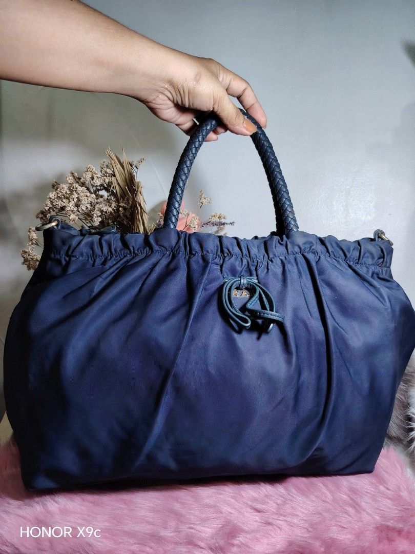 Prada Milano Blue Nylon Handbag (Category: Luxury Bags & Wallets) located in Bay. Submitted by silverhorse-59c851 (Listing ID 1469692311, Image 1). Description: ukay source good condition large size with minor issue sa handle nya..