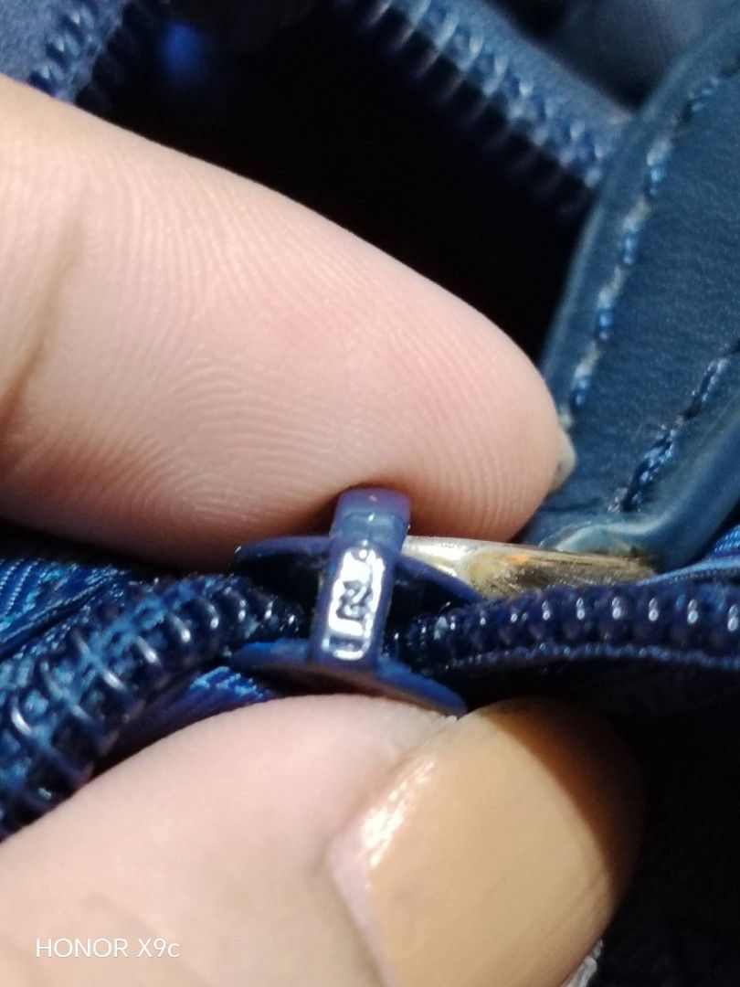 Prada Milano Blue Nylon Handbag (Category: Luxury Bags & Wallets) located in Bay. Submitted by silverhorse-59c851 (Listing ID 1469692311, Image 3). Description: ukay source good condition large size with minor issue sa handle nya..