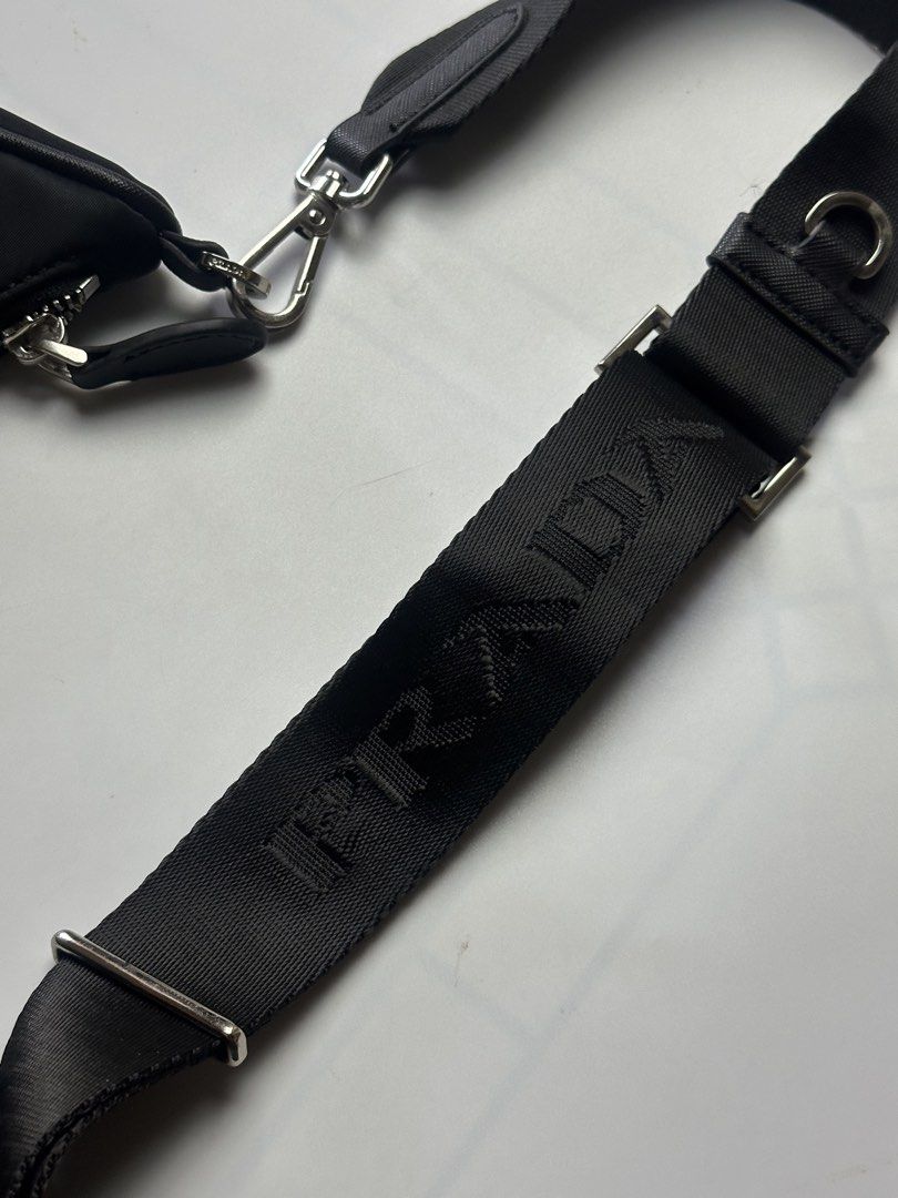 Prada re nylon 2005 (Category: Luxury Bags & Wallets) located in Orani. Submitted by ajgav69 (Listing ID 1469583017, Image 3). Description: Prada re nylon 2005 As new condition Lampo underzip No issue .