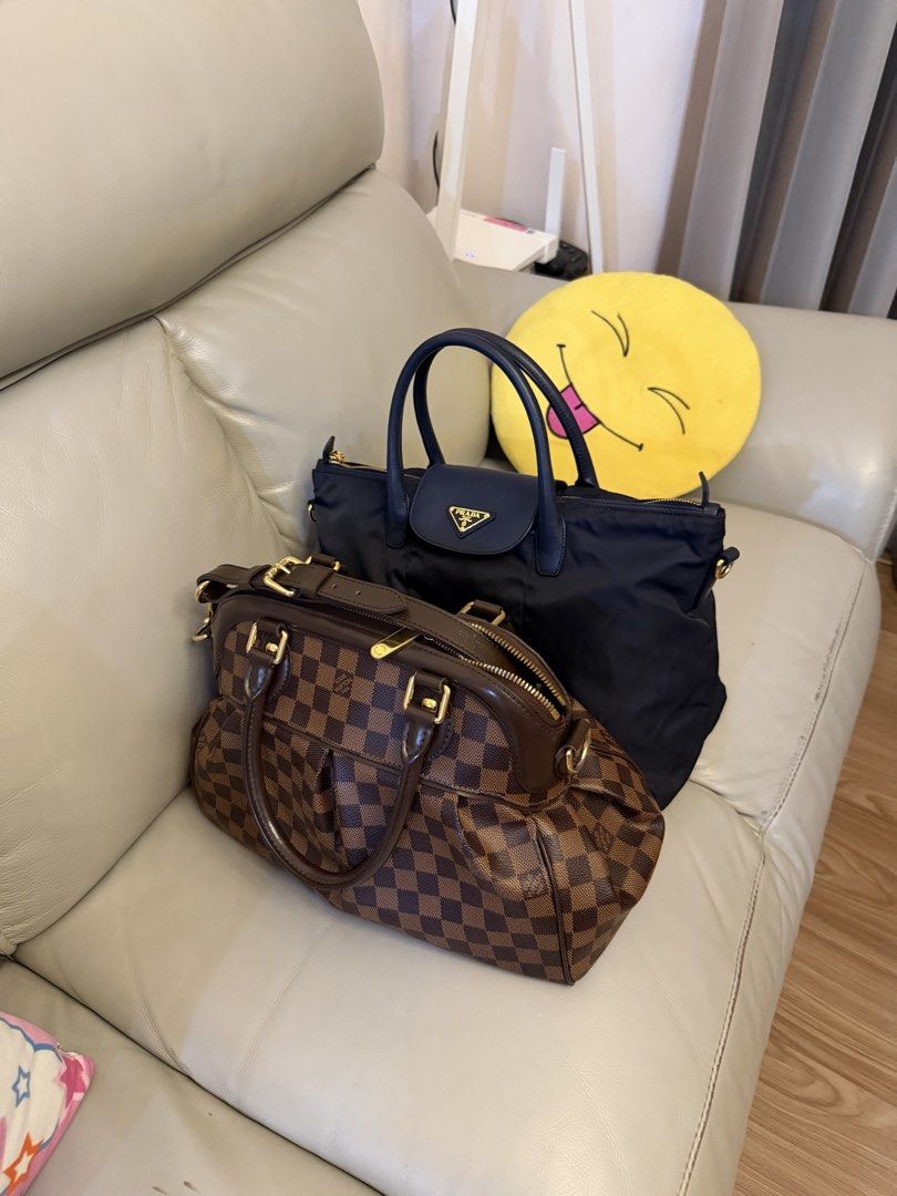 Prada Tessuto Nylon- Navy Blue (Category: Cross-body Bags) located in Makati City. Submitted by lambogirl (Listing ID 1469622050, Image 3). Description: ✔️comes with strap, dust bag and entrupy ✔️in excellent condition ✔️free shipping or pick up (Makati).