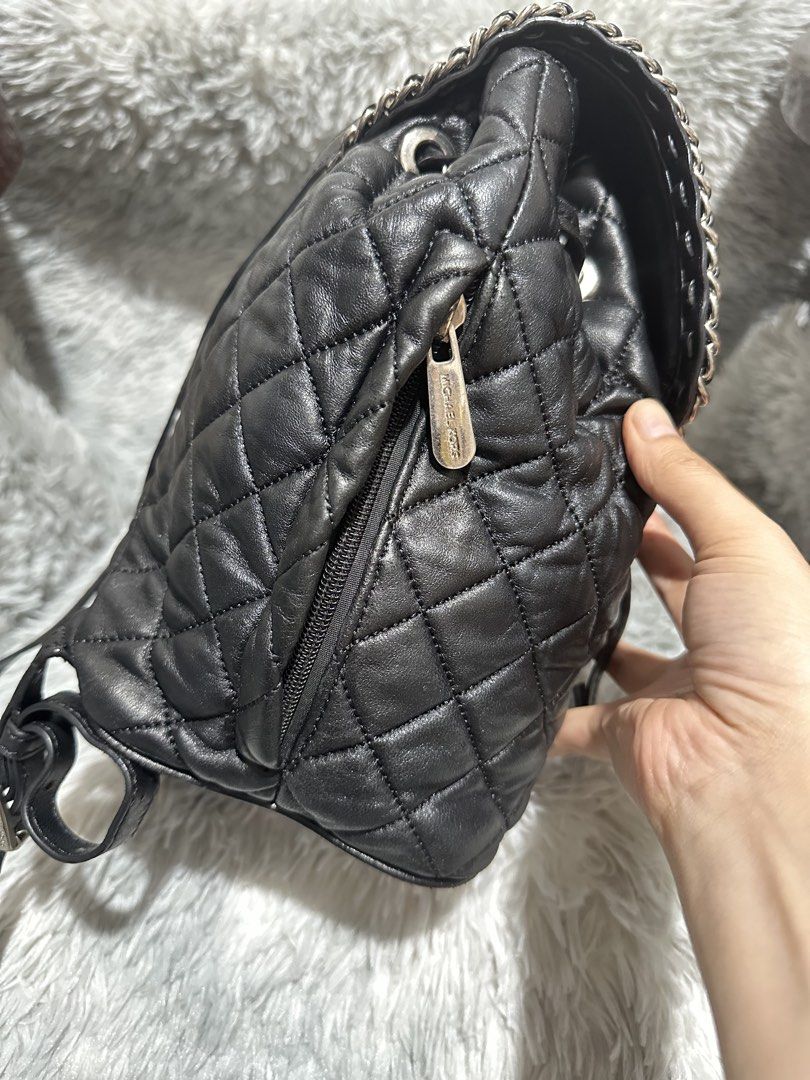 Preloved Mk Quilted leather Backpack original 💯 (Category: Backpacks) located in Caloocan City. Submitted by rqueenluxuryph (Listing ID 1469753396, Image 3). Description: Preloved Mk Quilted leather Backpack original 💯 Condition rate:8/10 Honest issue: sign of usage .